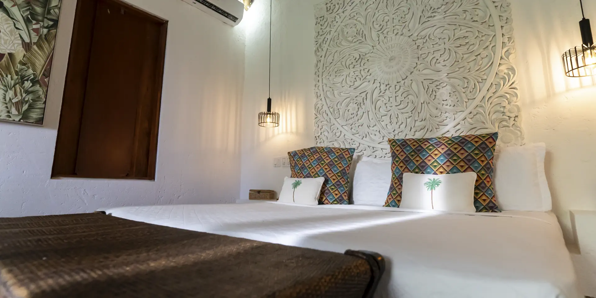 habitacion-con-cojines-de-palmera