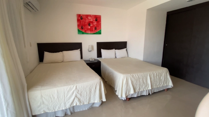 on-vacation-colombia-destino-cancun-hotel-dos-playas-habitacion-02