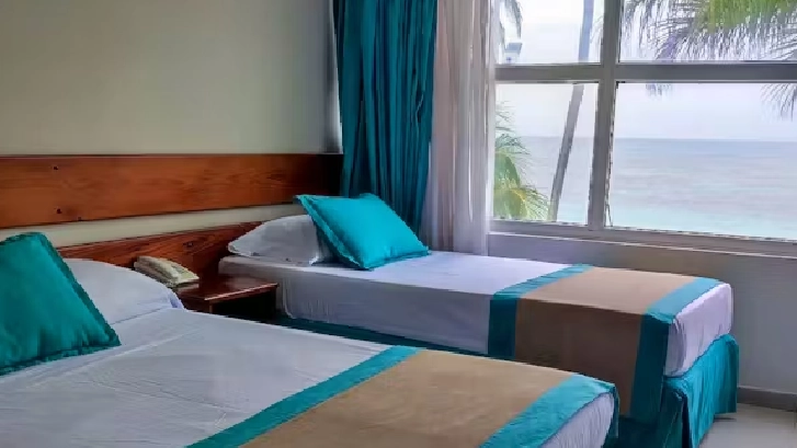 on-vacation-colombia-destino-nacional-san-andres-hotel-portobelo-beach-tipo-habitacion-estandar-twin
