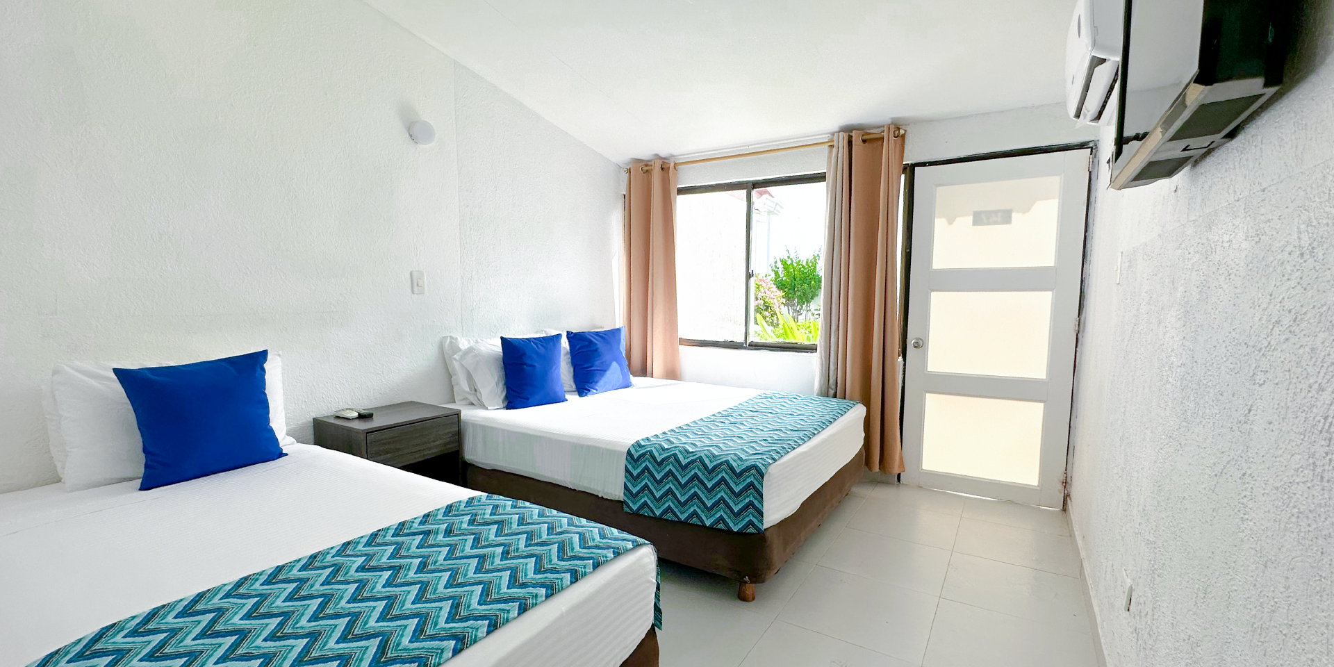 on-vacation-colombia-destino-nacional-san-andres-hotel-reef-dos-camas-doble