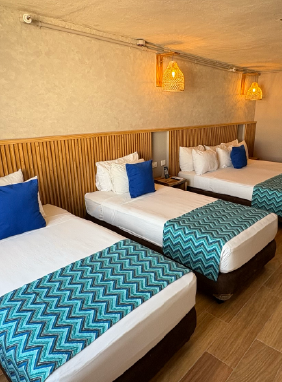 1 cama doble, 2 camas sencillas, capacidad: 3 personas.
Ver más
Triple